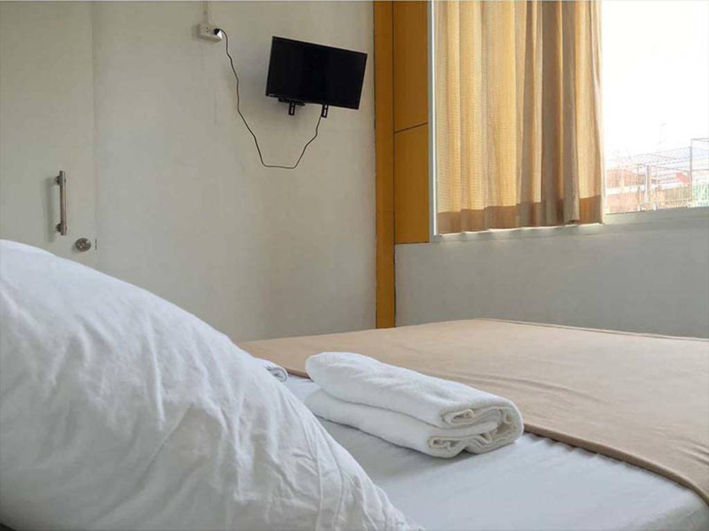 Warm White Hostel Bangkok Rum bild